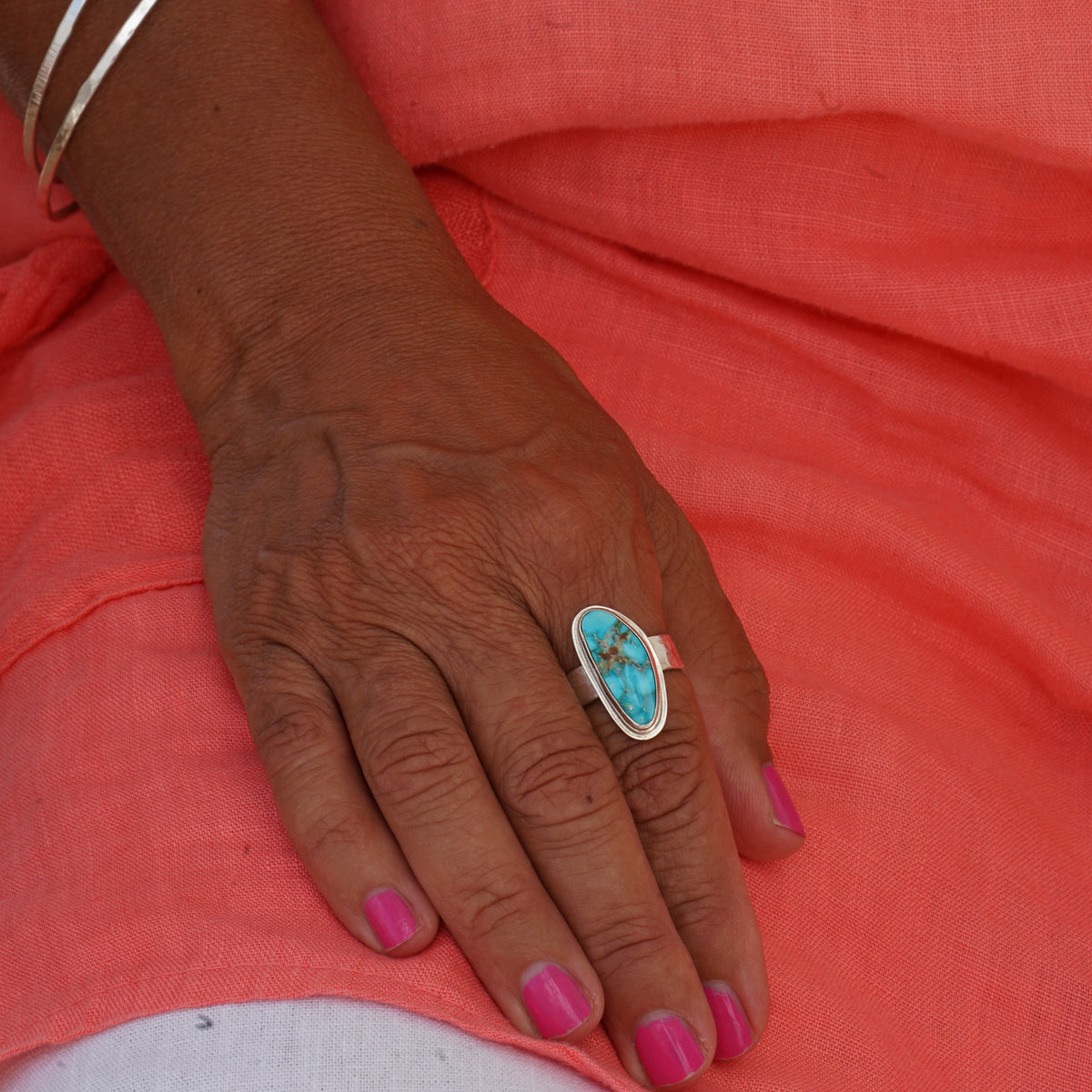 Kingman Turquoise Long Triangle on a Hammered Silver Ring Band