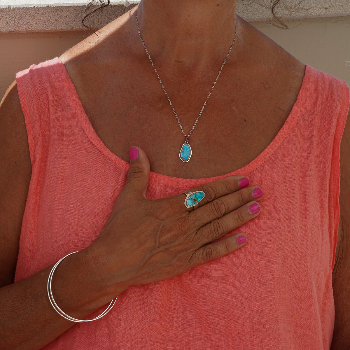 Kingman Turquoise Long Triangle on a Hammered Silver Ring Band